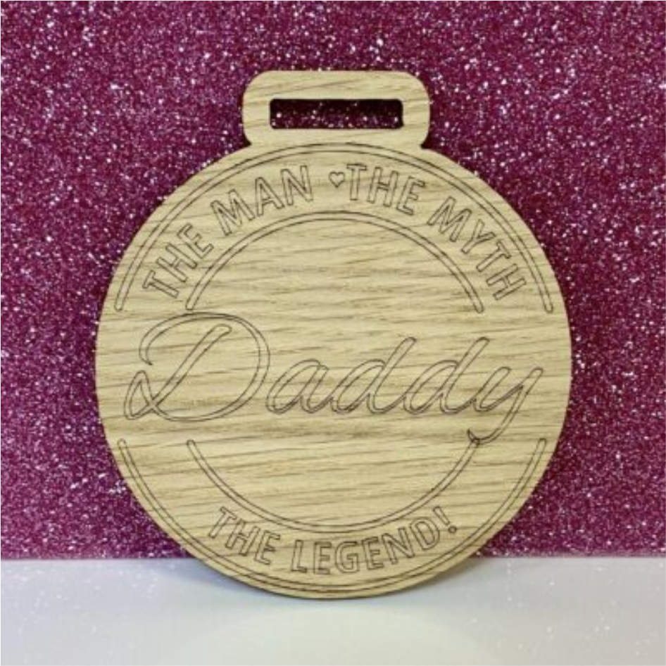 10cm OAK VENEER MEDAL WITH 'THE MAN, THE MYTH, THE LEGEND' ENGRAVED